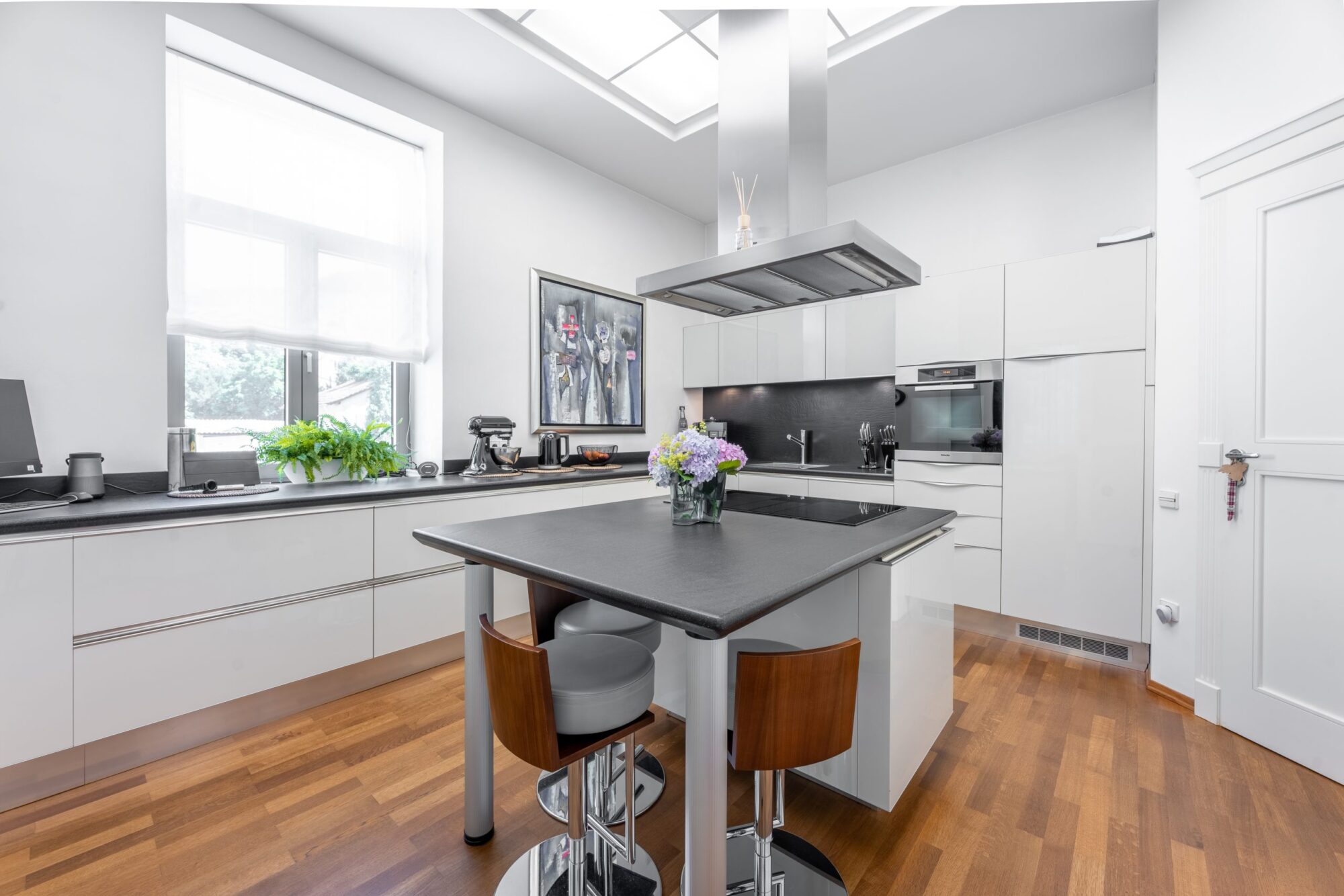 Modern white kitchen with central island