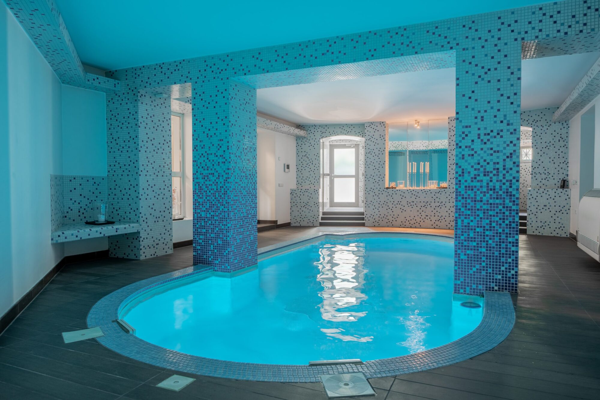 Indoor pool with blue mosaic tiles