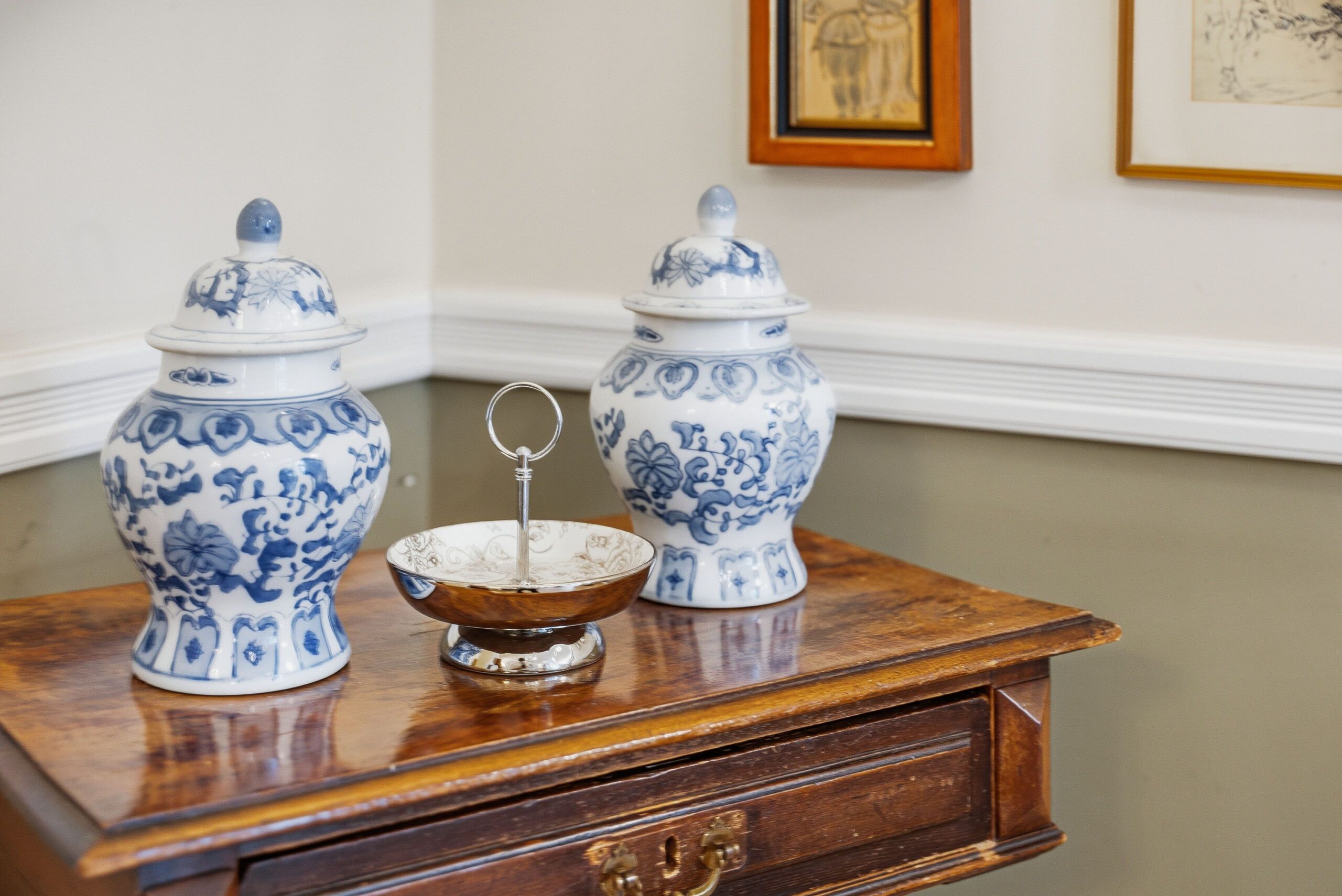 Blue and white porcelain jars on antique table