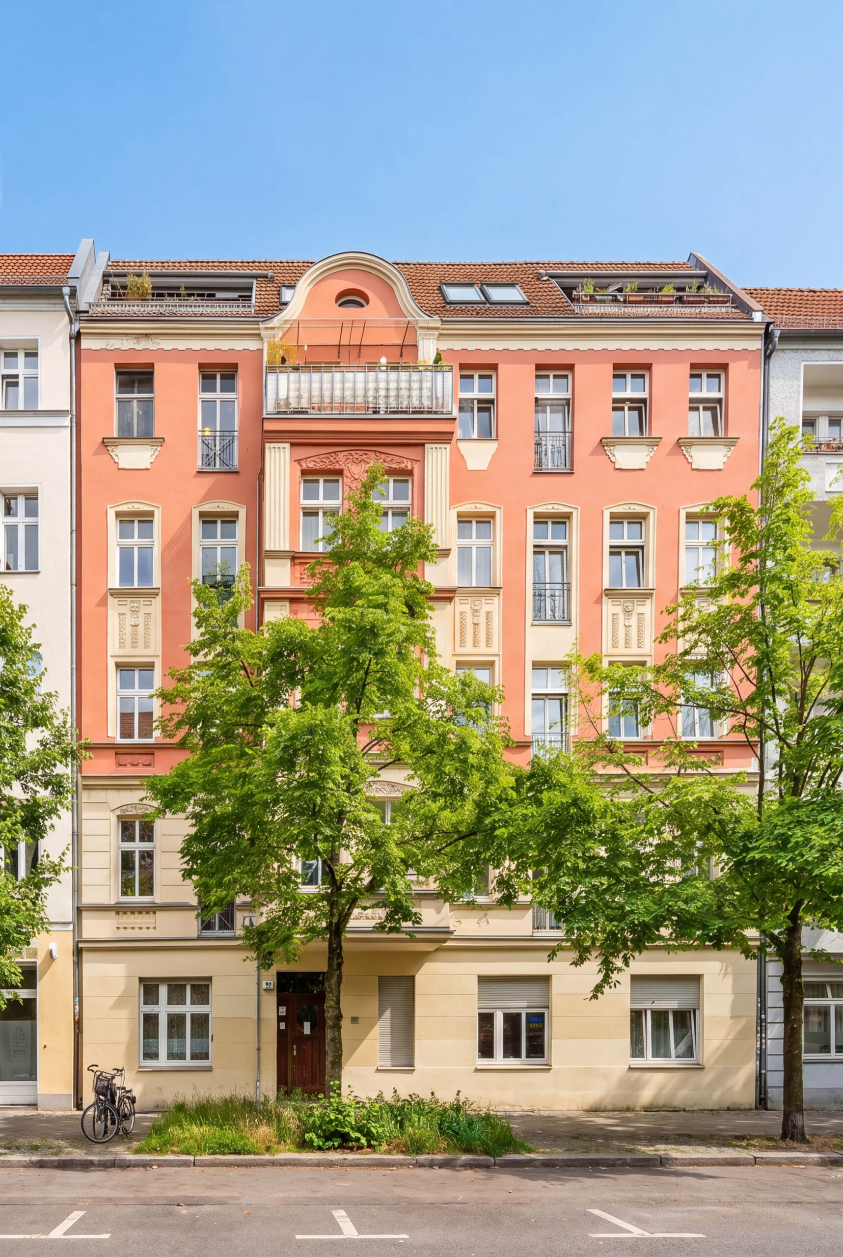 Exterior facade of historic apartment building, daytime