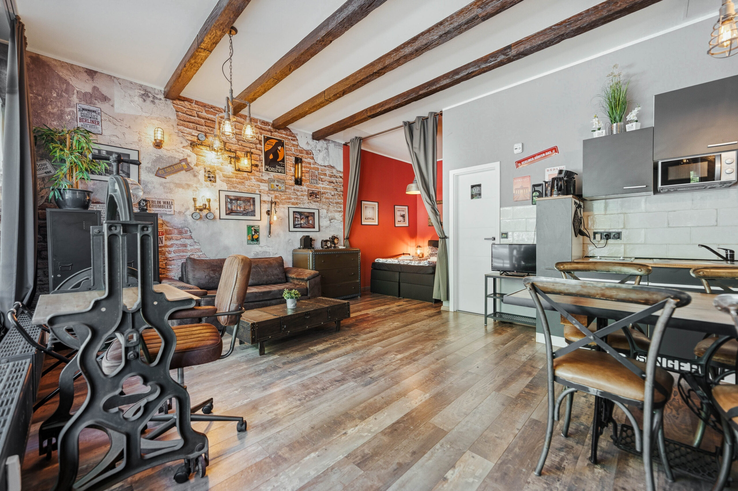 Open-plan loft with living, dining and kitchen areas
