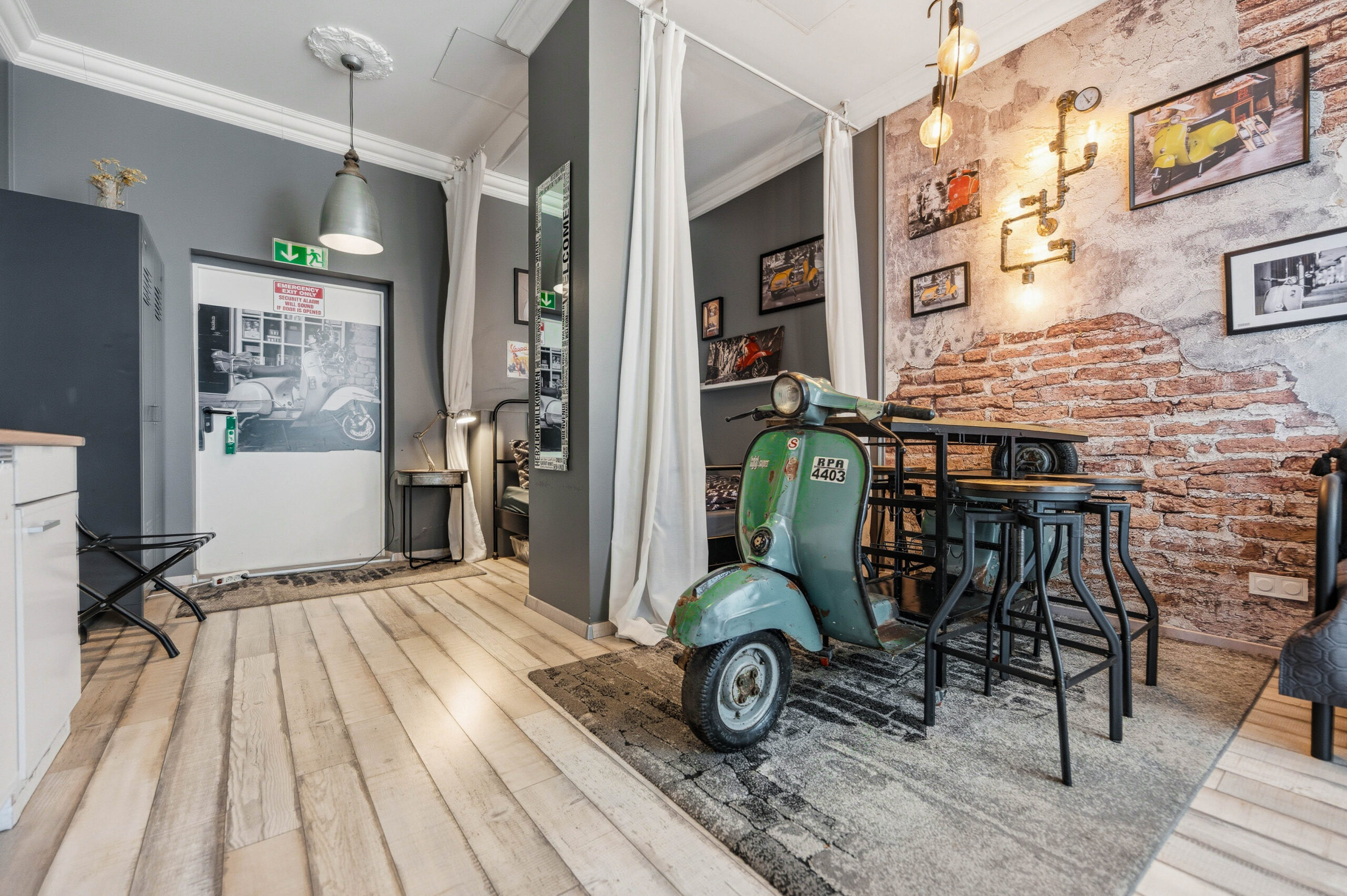 Hallway view toward scooter and dining area
