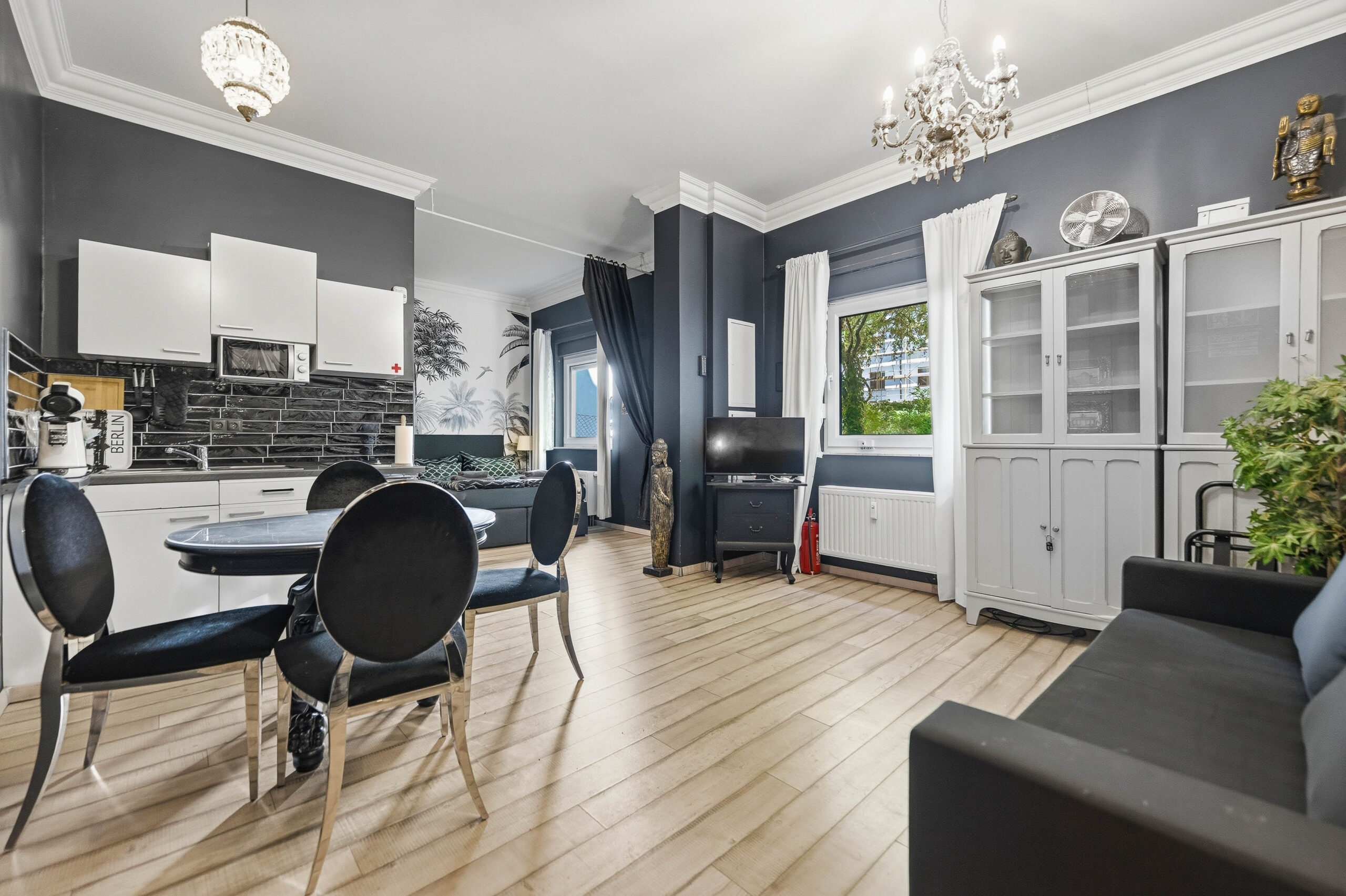 Open living and dining area with kitchen view
