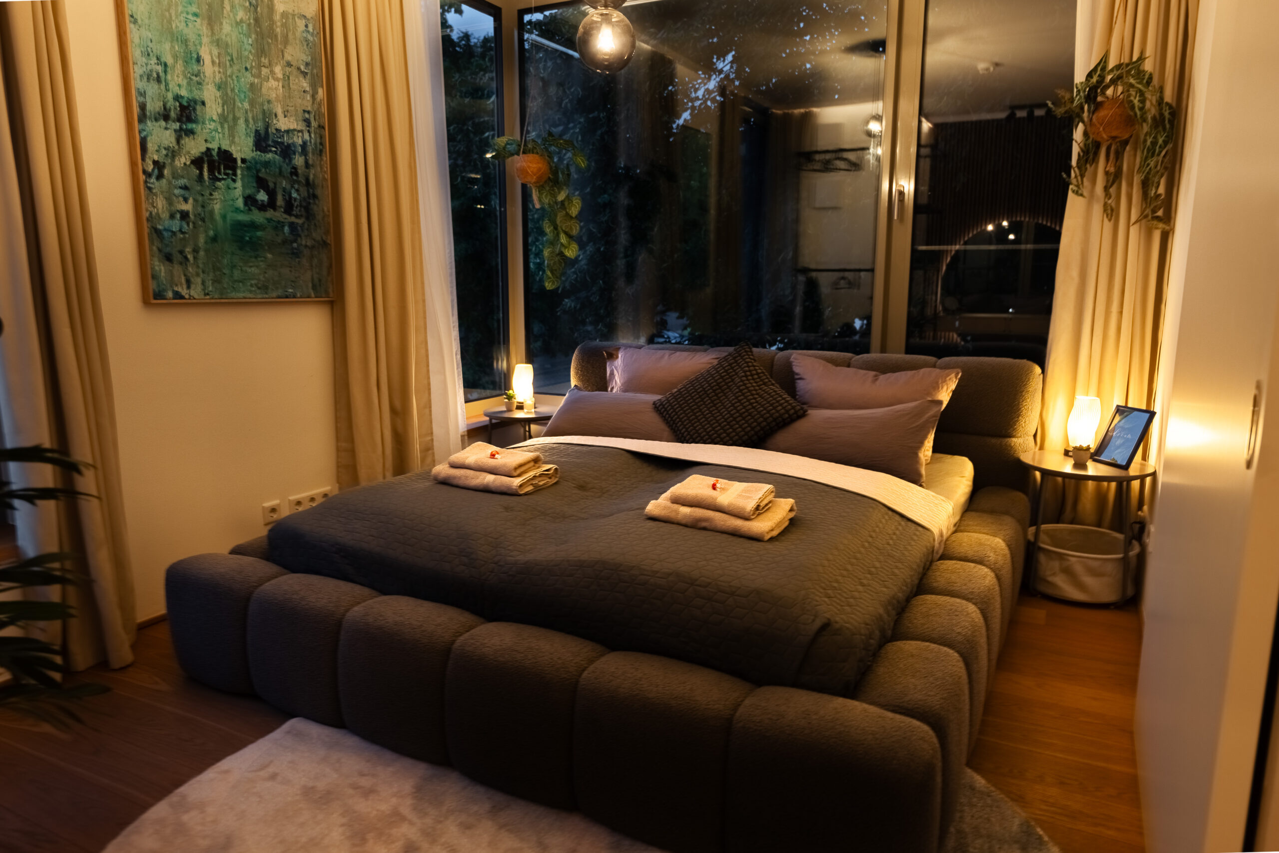 Modern bedroom with low platform bed and window views