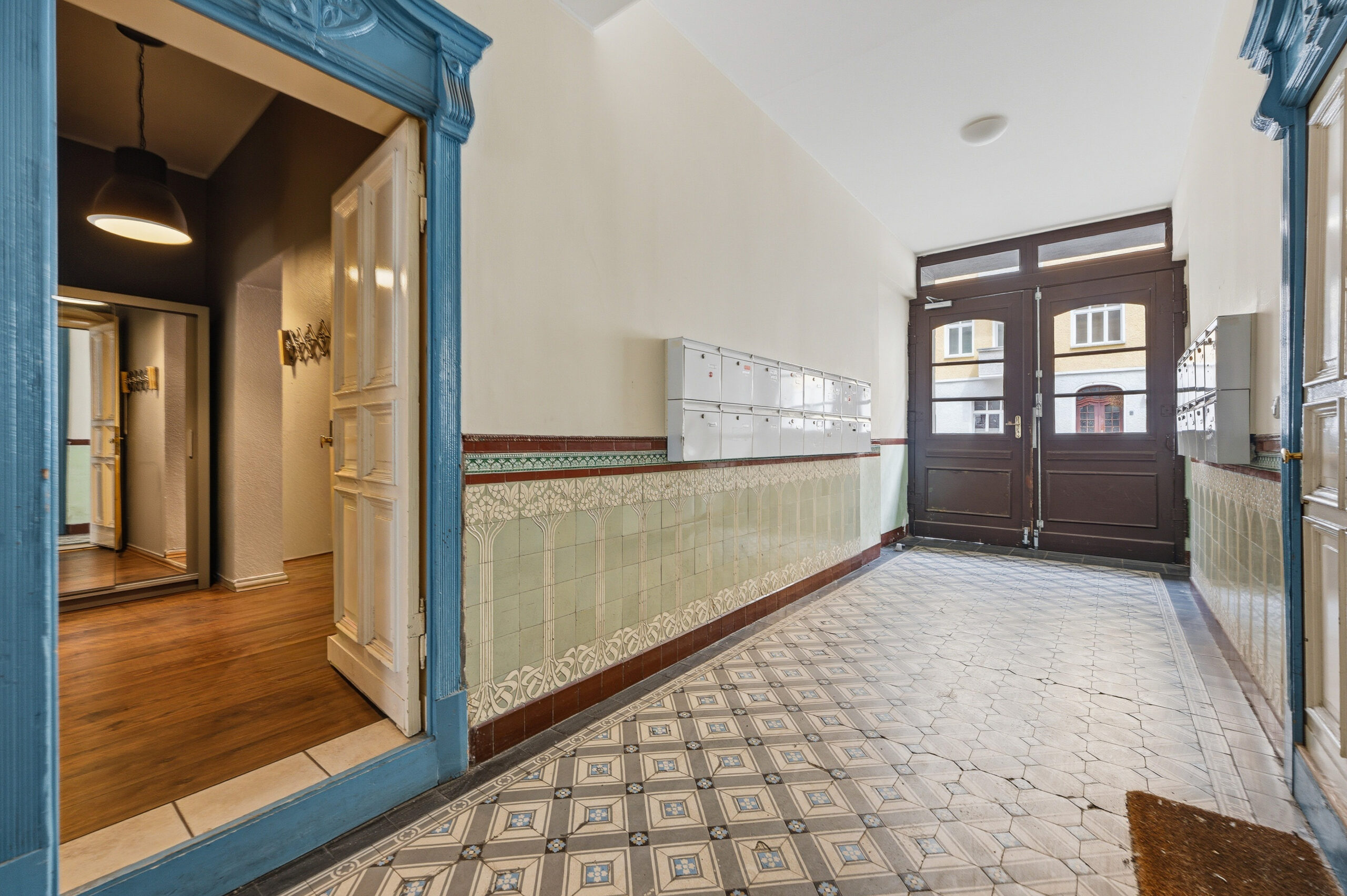 Entrance hallway with patterned tile floor