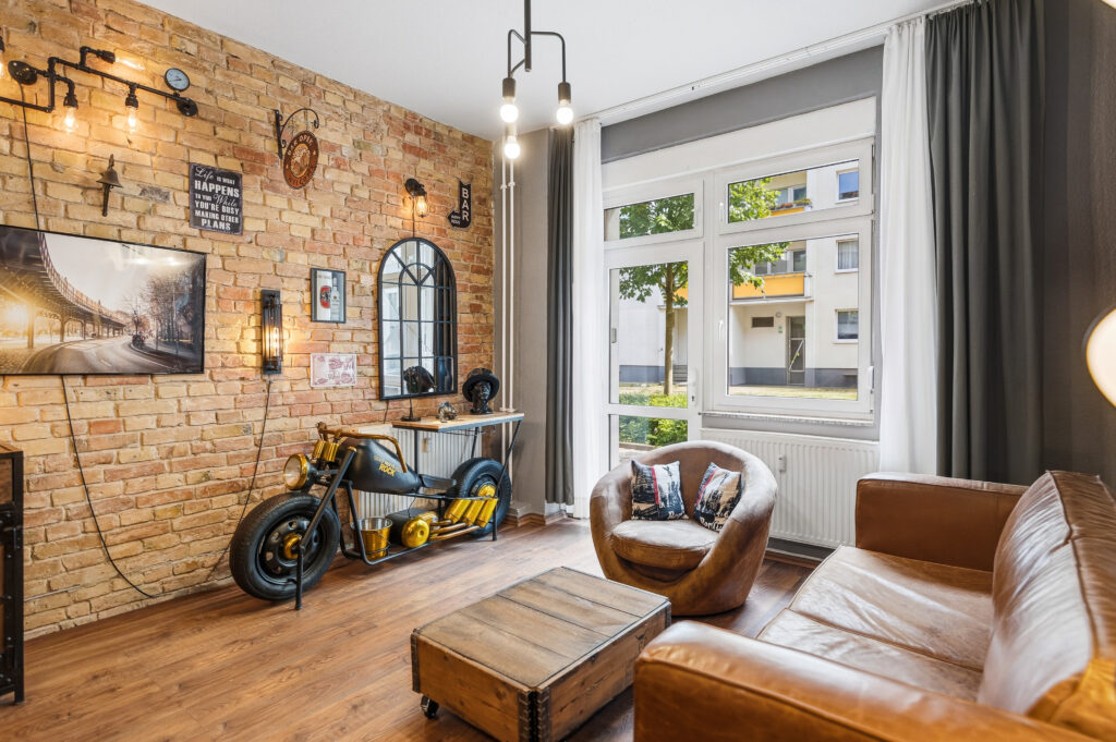 Living room with novelty motorcycle and leather chair