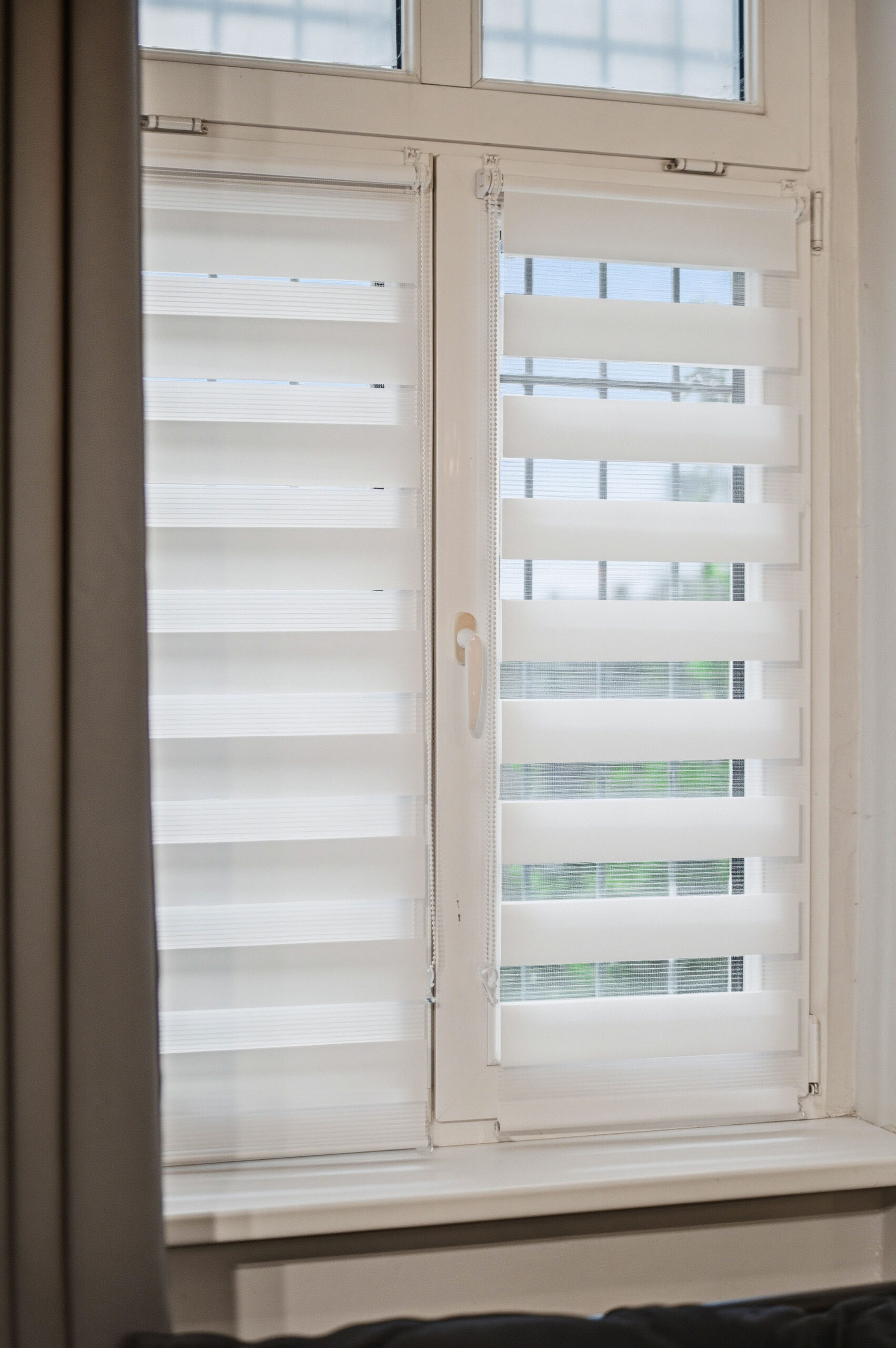 Frosted glass cabinet doors with horizontal blind pattern detailing