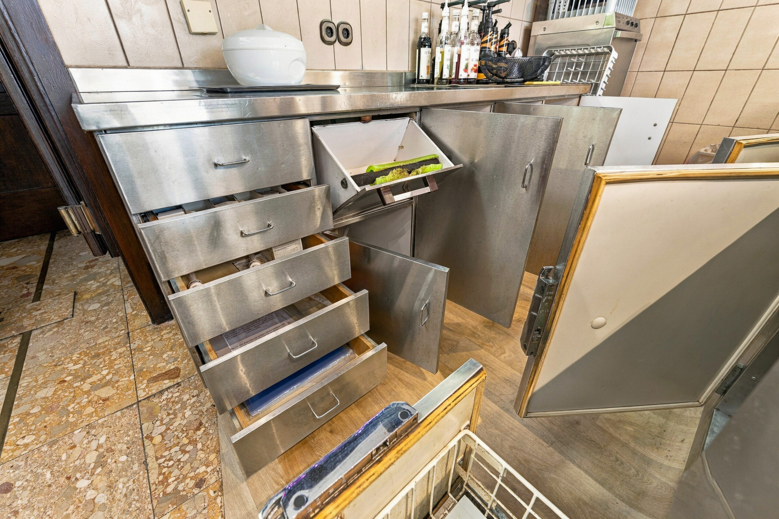 Stainless steel kitchen drawers and counter detail