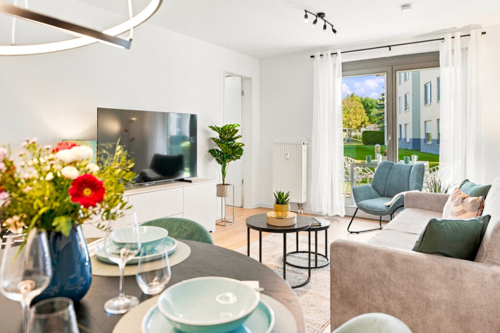 Open living and dining area with sofa and table