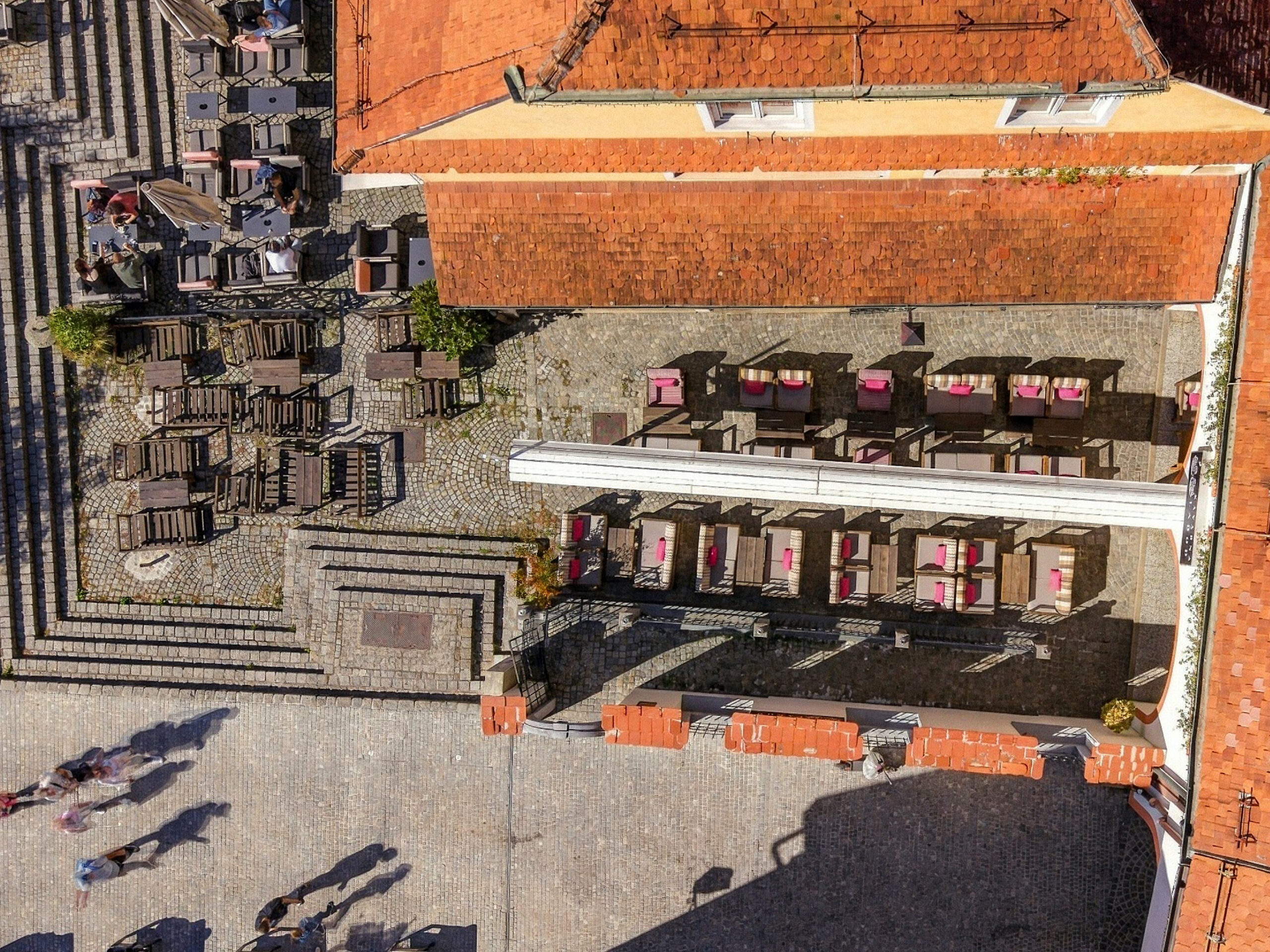 Aerial view of rooftop terrace with market stalls