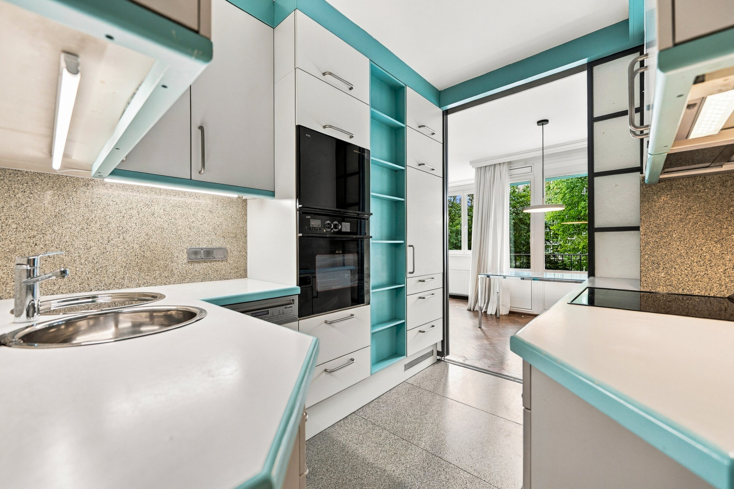 Kitchen view opening to dining room beyond
