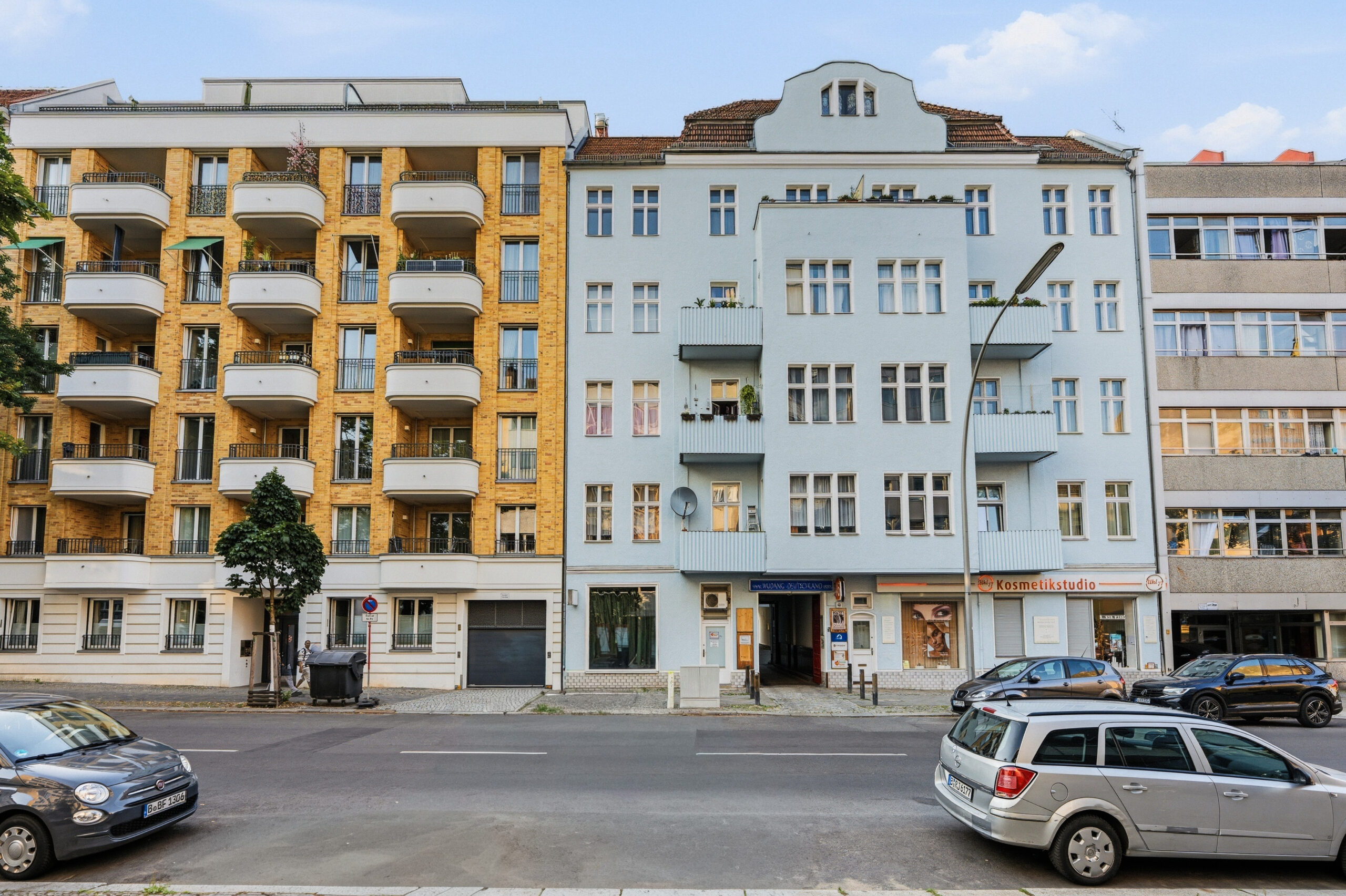 Urban street façade with colorful residential buildings
