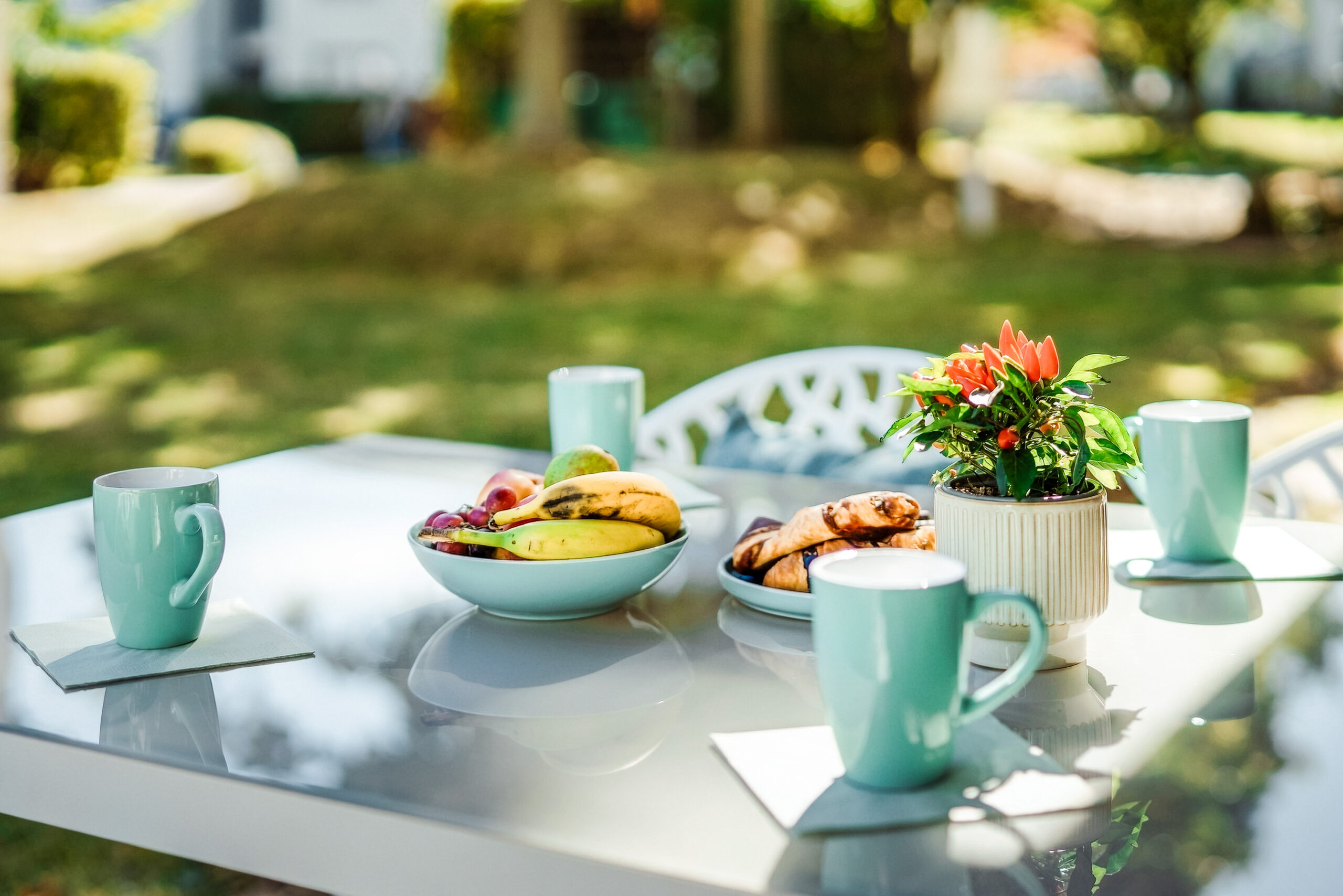 Close-up of breakfast spread on outdoor table